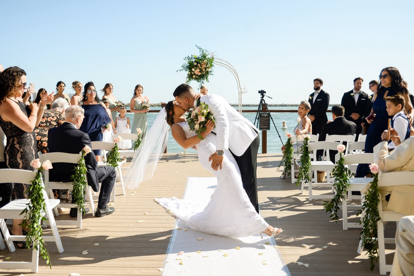 Daniel and Brooke Romolo at their waterfront wedding ceremony